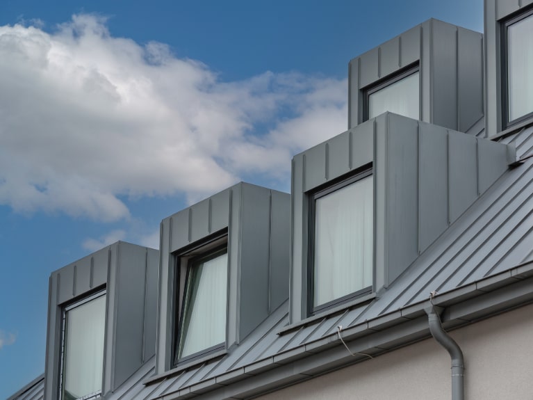 Aluminium Standing Seam Cladding on a House Roof