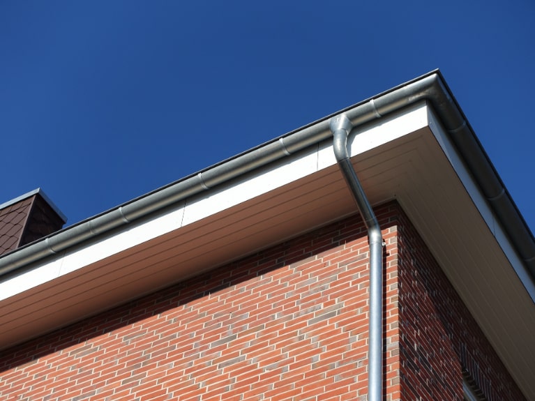Galvanised Steel Gutter on Brick House